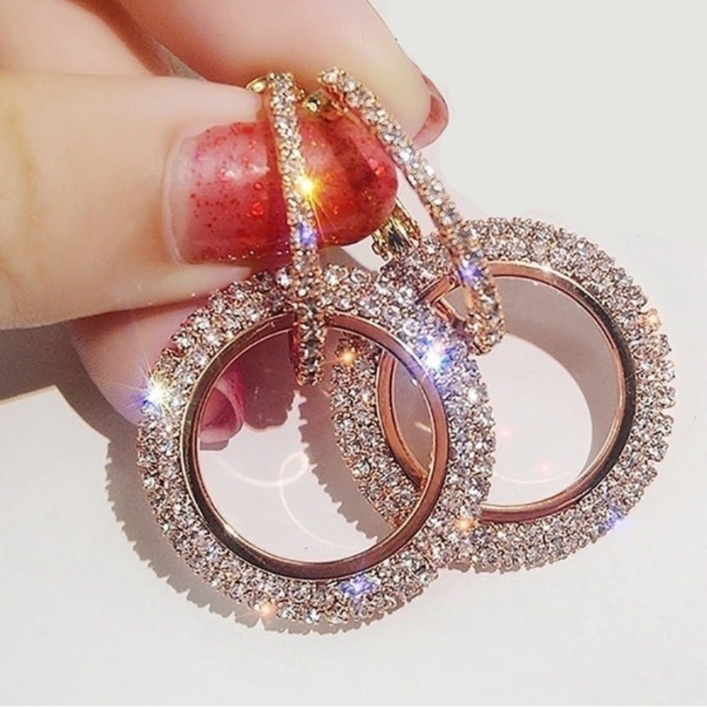 NWT Cubic Zirconia Earrings. Rose gold finish.